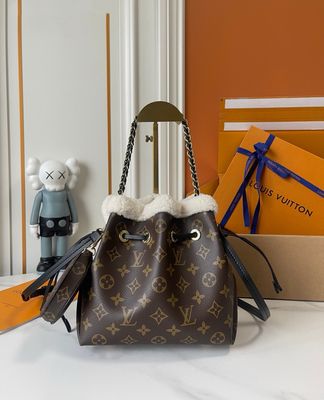 Louis Vuitton Crossbody Bag — ODSH18 Carryall BB Monogram Shearling Bucket Bag