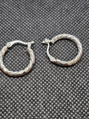 cut silver earrings