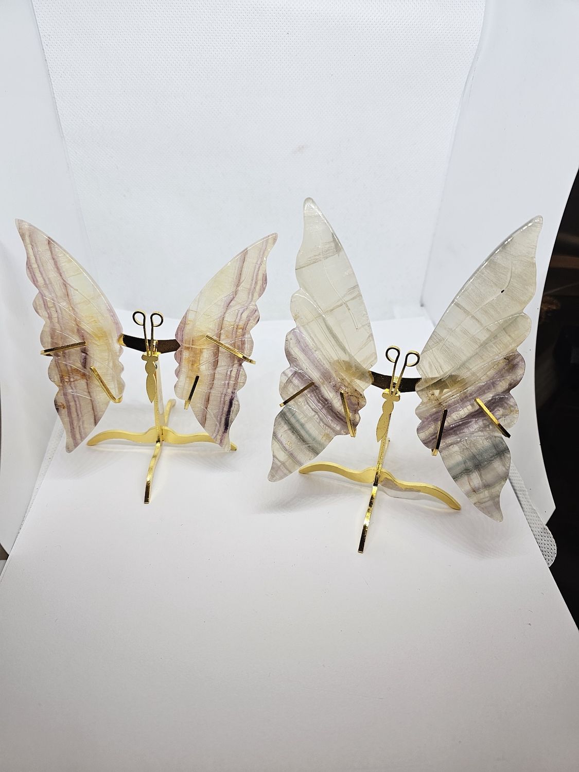 rainbow fluorite butterflies on stand