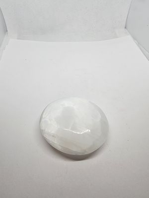selenite faceted palm stone