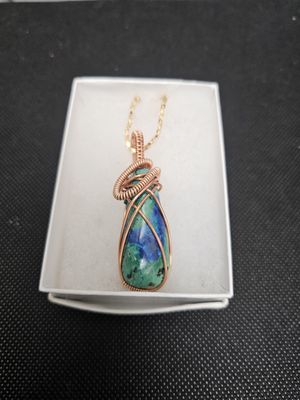 copper wire wrapped river blue pendant