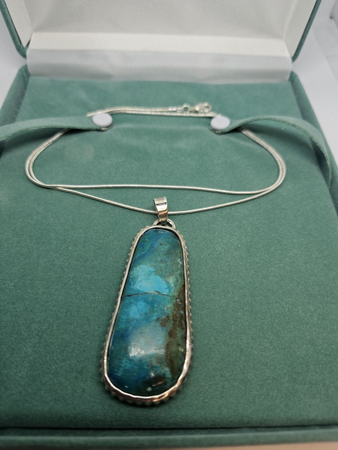 chrysocolla turquoise set in silver pendant