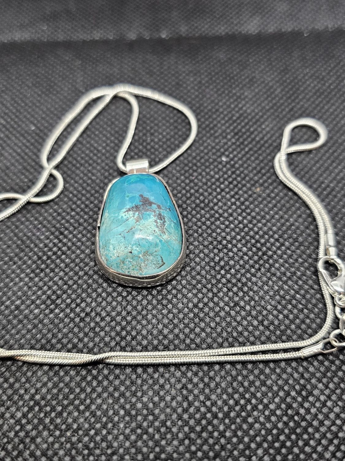 chrysocolla in silver pendant