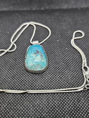 chrysocolla in silver pendant