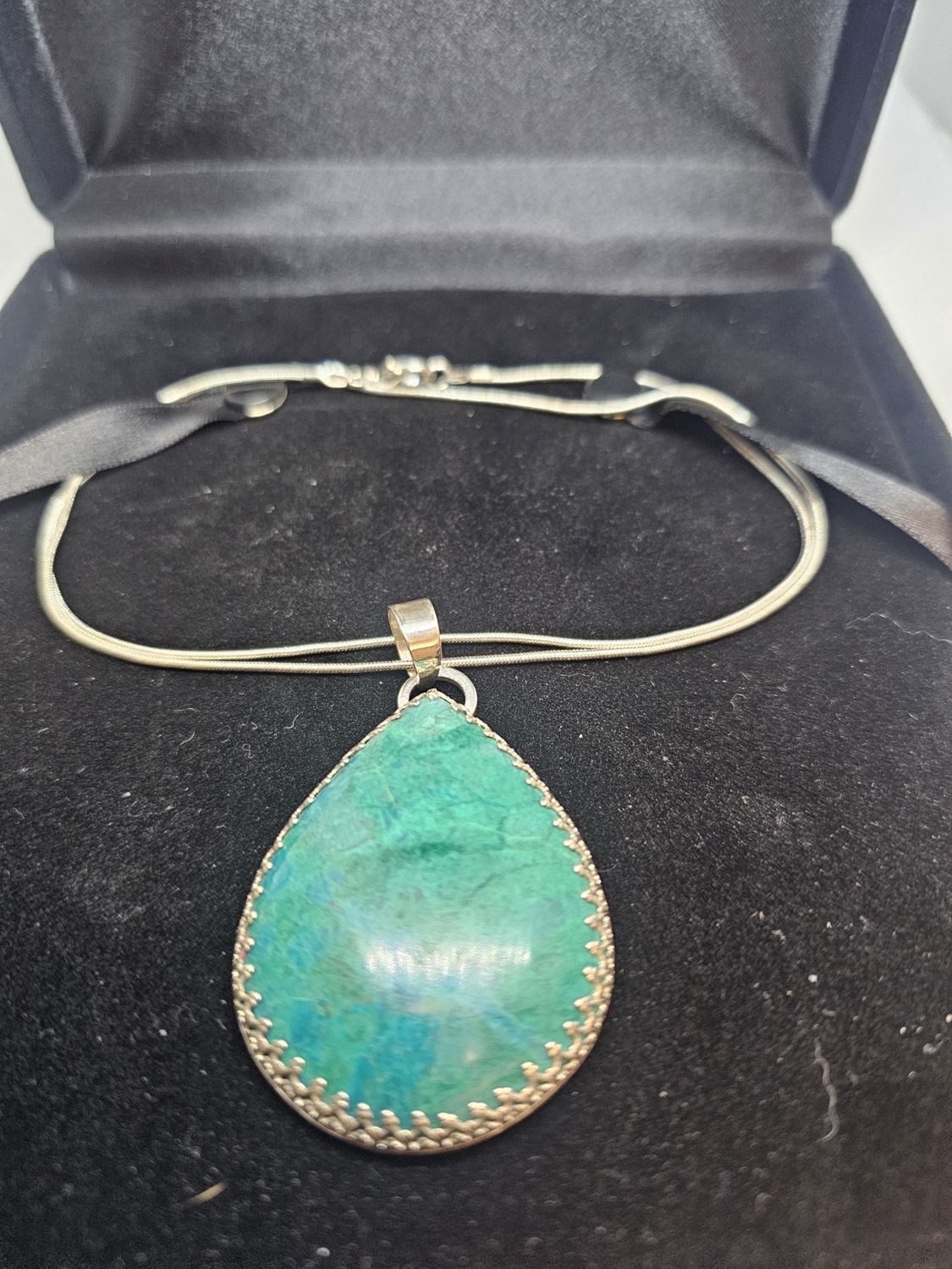 large chrysocolla turquoise set in silver pendant