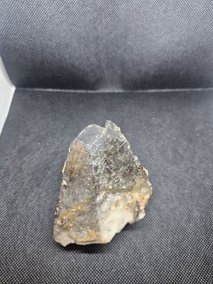 medium smokey dogs tooth calcite specimen