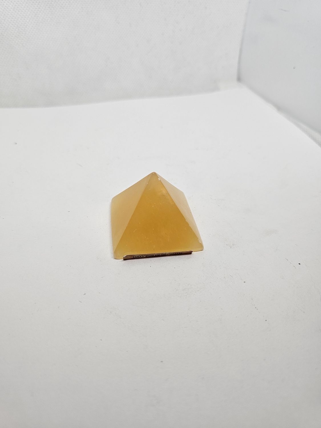 orange calcite pyramid