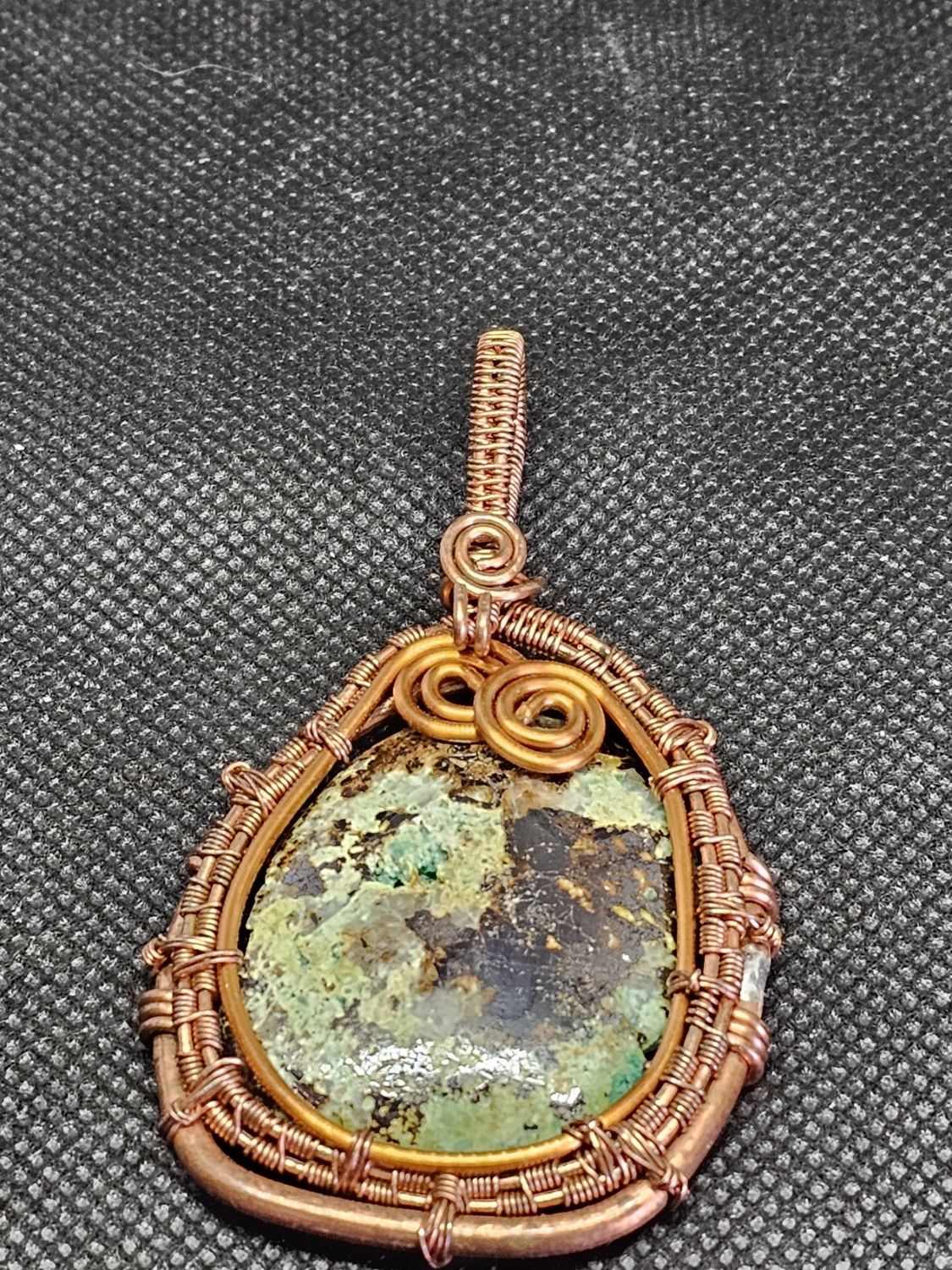 #16 turquoise w/ limonite after pyrite wire wrap