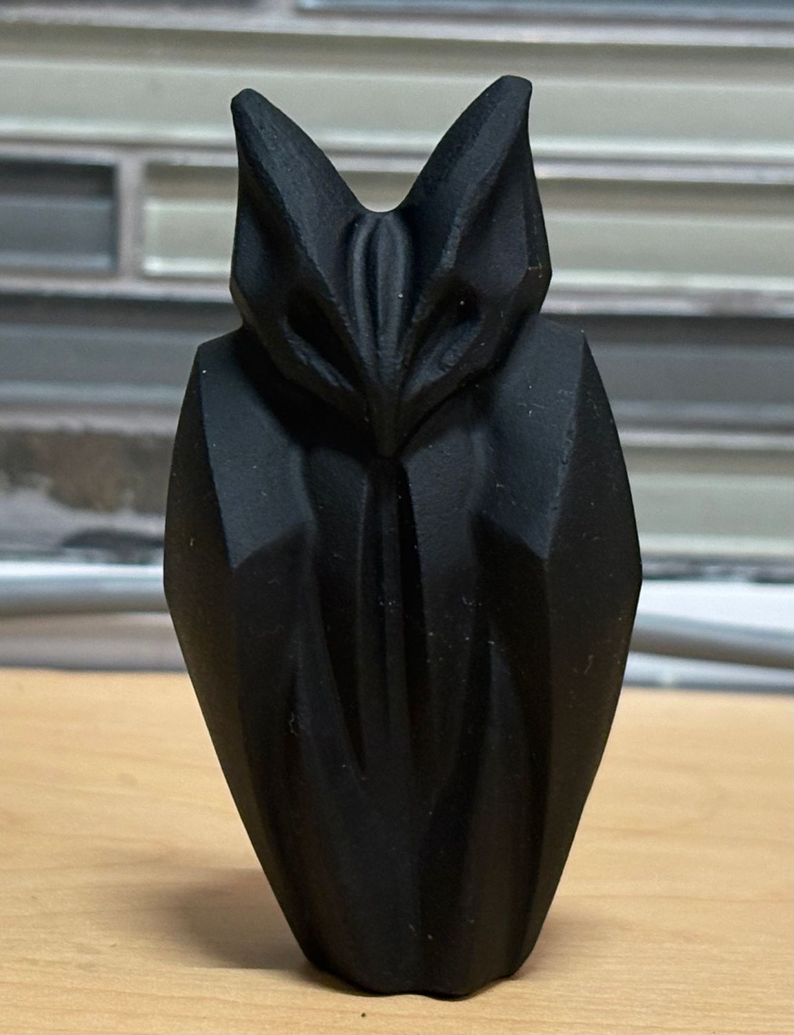 Obsidian Wrapped Bat Carving