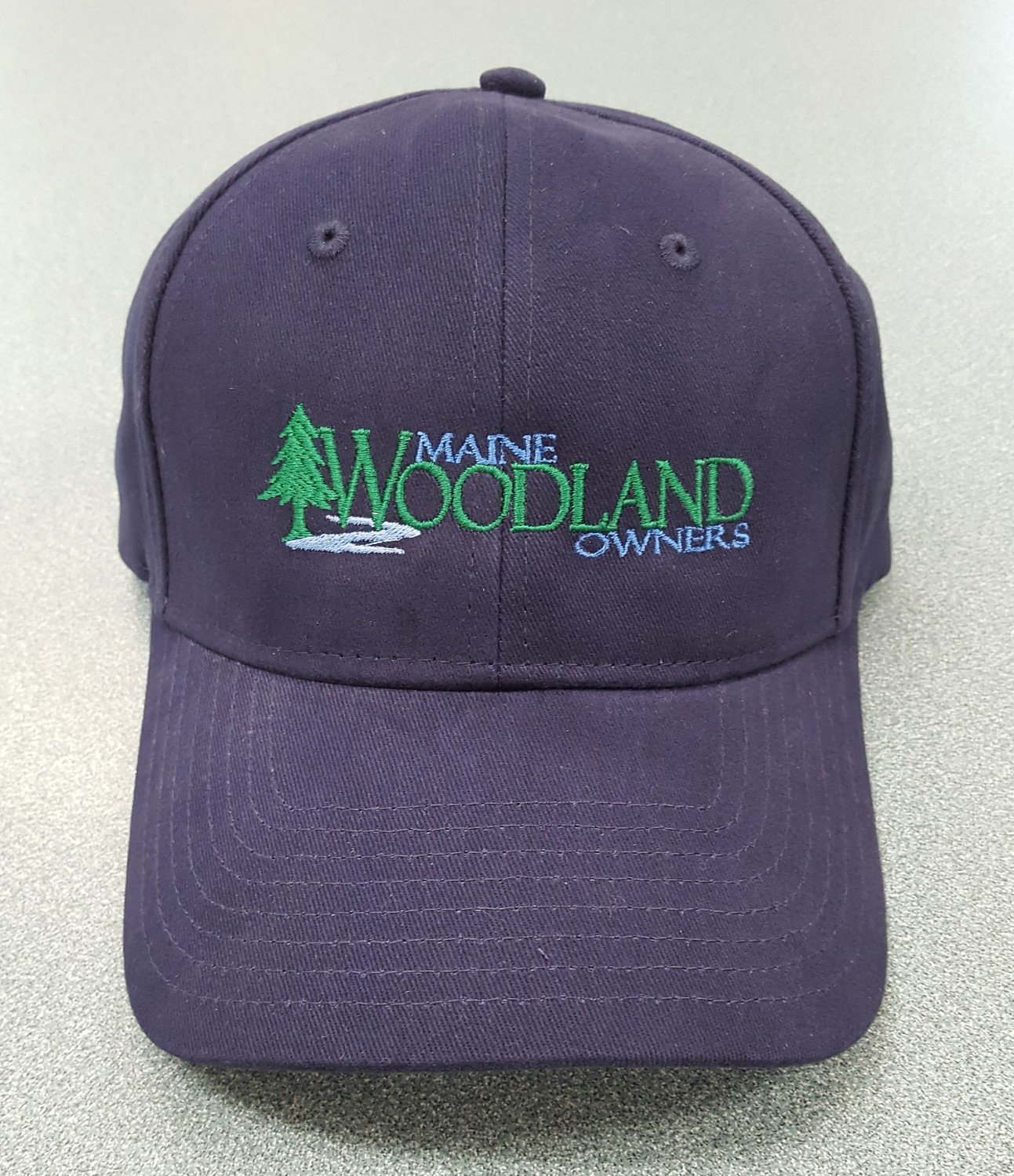 Maine Woodland Owners logo hat in Navy