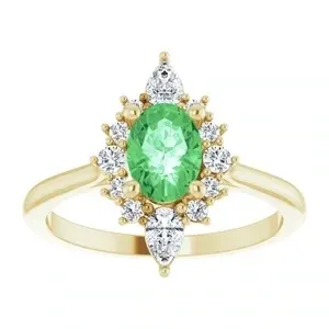 14K Yellow 7x5 mm Oval AA Tsavorite Garnet with1/3 CTW Diamond accents Halo-Style ring. Diamonds are Clarity, Color SI2-SI3, GHI, G-H :: 3/8 CTW​