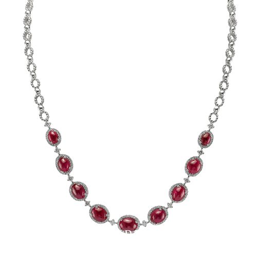 A 19.48 Ct. Ruby and Diamond Necklace, 18K White Gold. The necklace primarily features with 9 red oval shaped cabochon cut rubies. 209 round diamonds 1.86 ctw vs2 grade