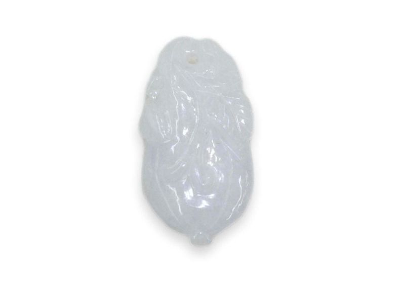 Type A natural jadeite pendant. Hand-carved and hand-polished. One drill hole.