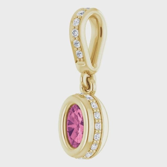 10K Yellow Pink Tourmaline .50ct 6x4mm oval pendant with white Sapphire accents.