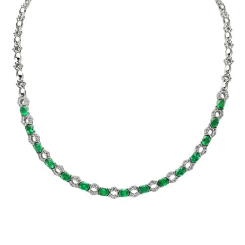 A 4.65 ct oval emerald necklace, VSI grade. The necklace also features 96 white round brilliant diamonds 0.96 ctw clarity grade F VSI