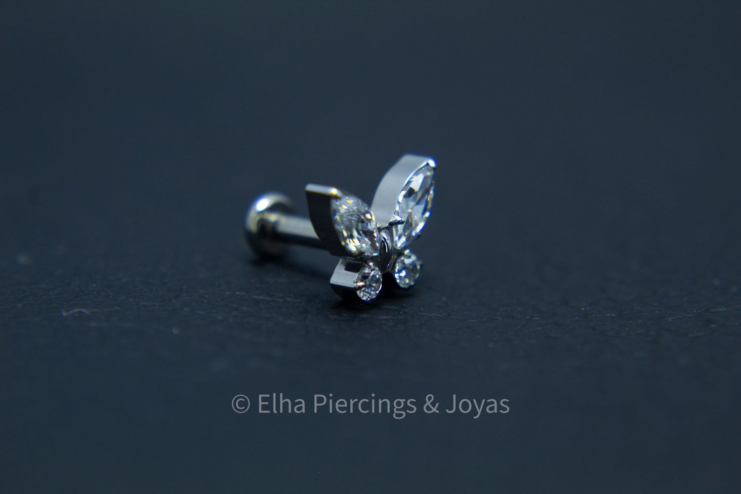 Mariposa cristales de zirconia marquise y redondos