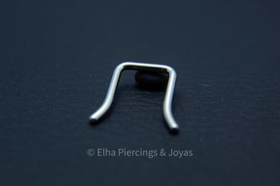Retenedor para septum