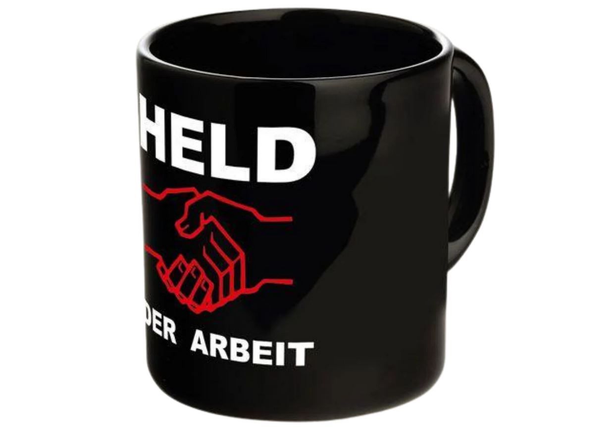Kaffeebecher &quot;Held der Arbeit&quot; schwarz