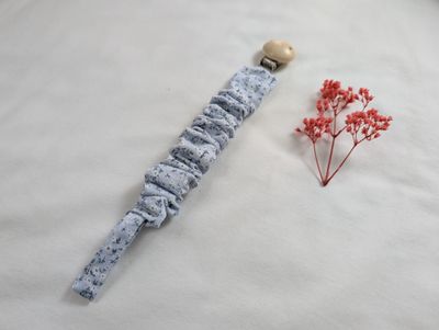 Chupetero florecita azul