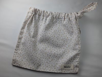 Bolsa multiusos florecita beige