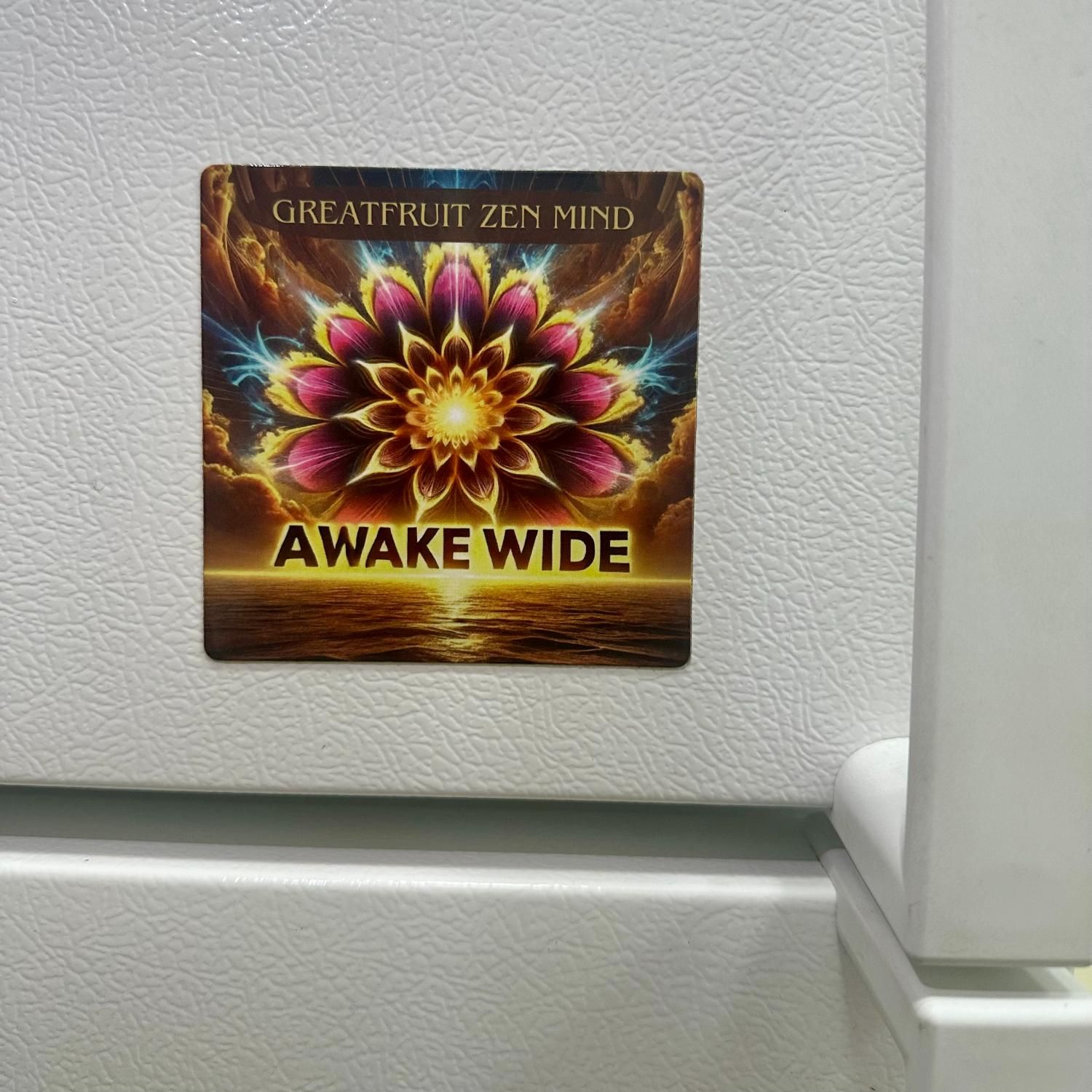 Large Magnet—Awake Wide Large Awake wide magnet featuring an eye-catching mandala stuck next to refrigerator handle.