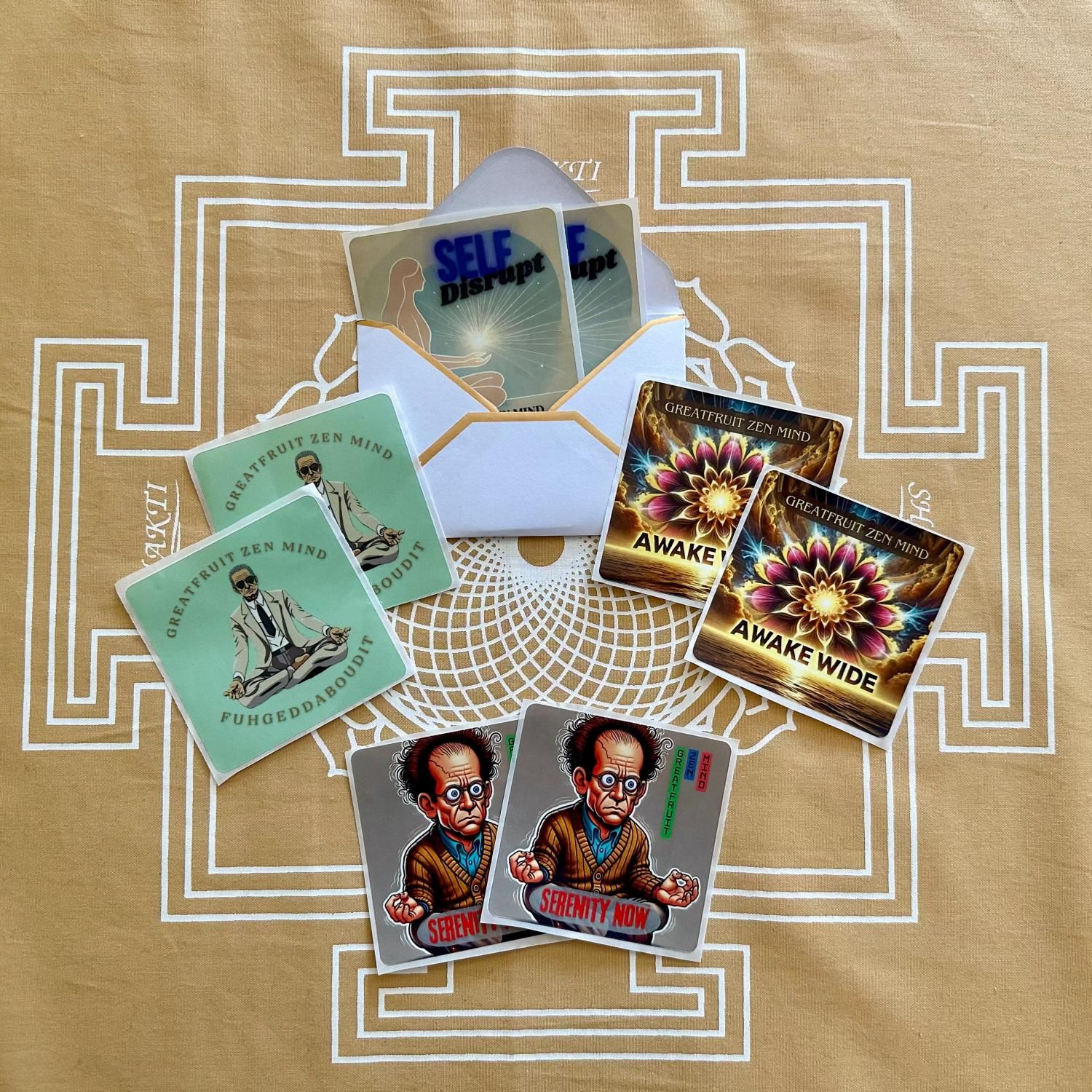 Complete set of all four Karmic Shift stickers and a single carry envelope fanned out for display.