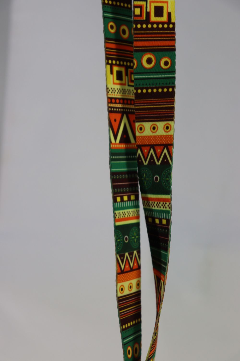 Poly Uke Neck Clip - Green/Orange Geometric