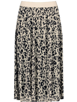 Woman In Gold Seashell Patterned Skirt