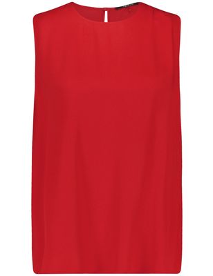 Woman In Red Sleeveless Blouse - Aperol