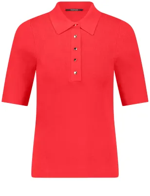Woman In Red Knitted Polo Shirt - Aperol