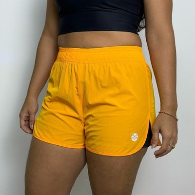 Chic and Sporty Women's Action Shorts in Saffron
