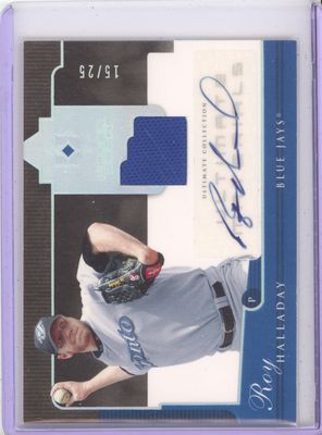 2005 Upper Deck Ultimate Collection - #UG-HA Roy Halladay Ultimate Materials Game Used Patch Auto /25