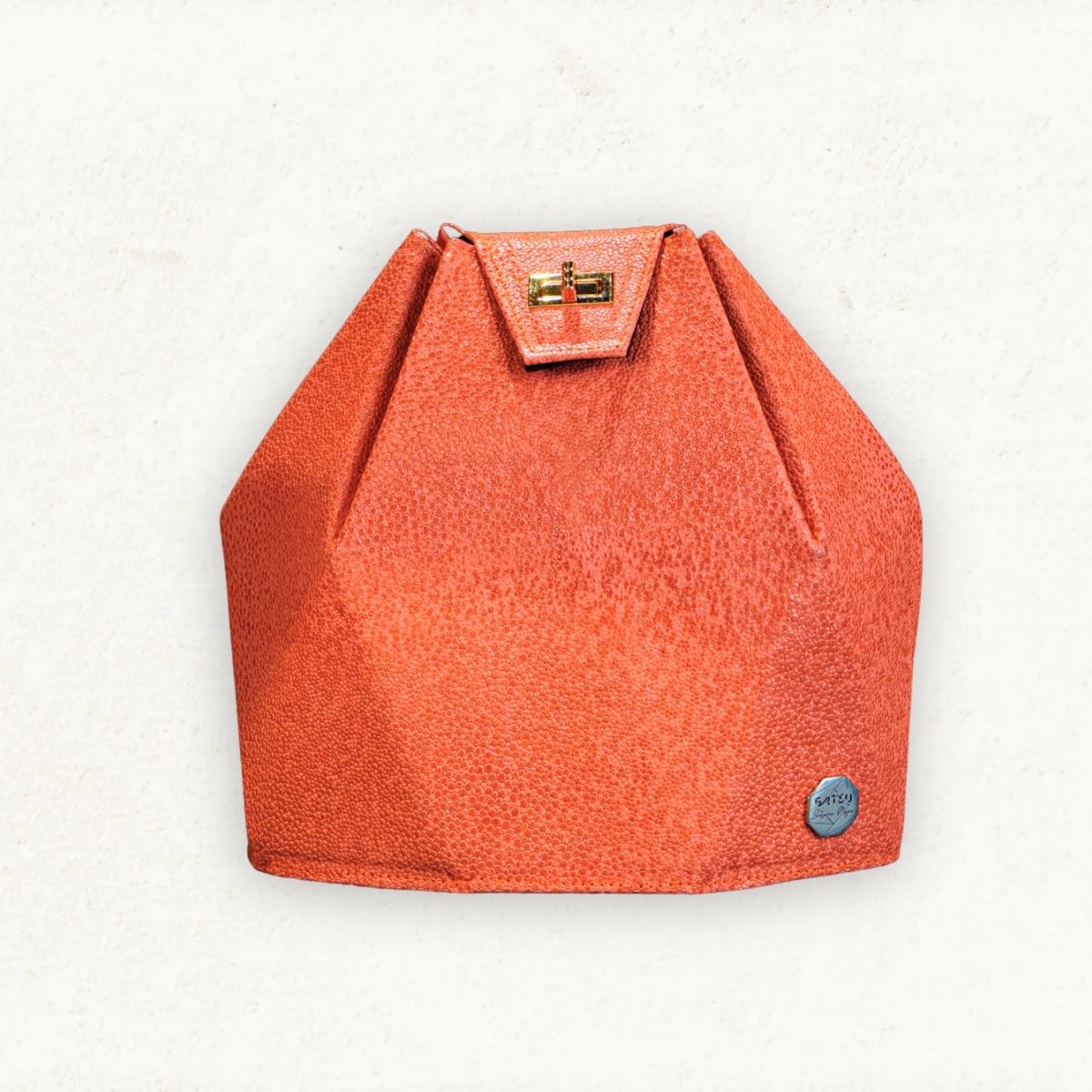KOKORO BACKPACK - CUERO CORAL CON TEXTURA