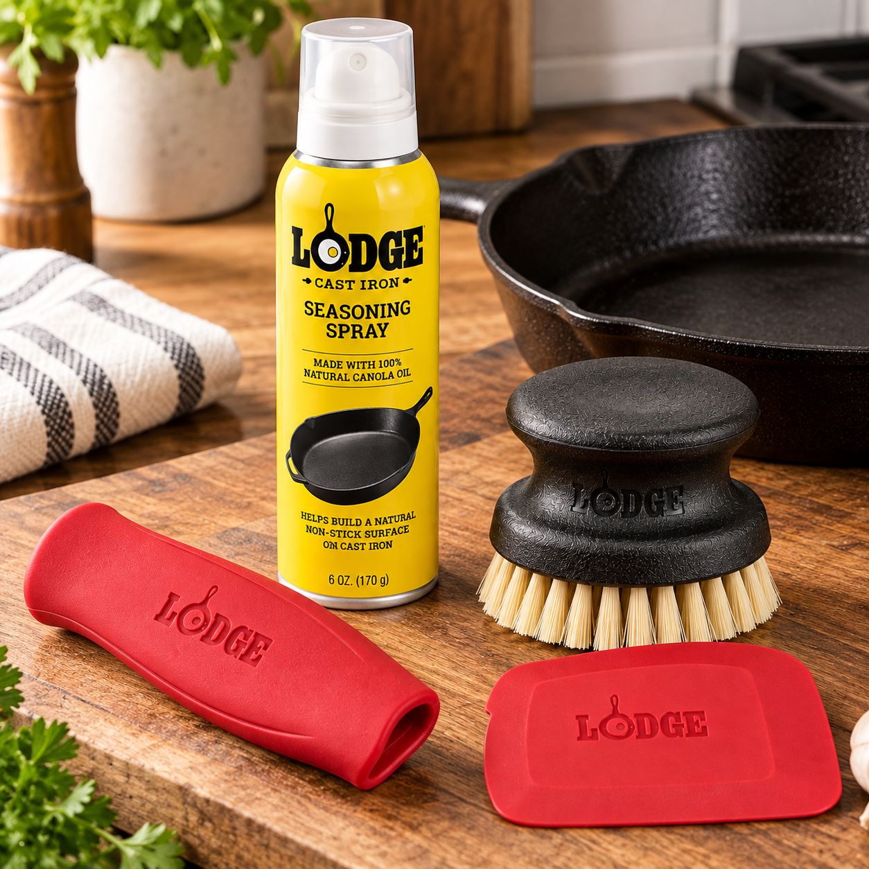 LODGE SEASONED CAST IRON CARE KIT WITH 6 OZ SEASONING SPRAY, PAN SCRAPER, SILICONE HANDLE HOLDER &amp; SCRUB BRUSH – A-CAREC1 – UPC 075536045733