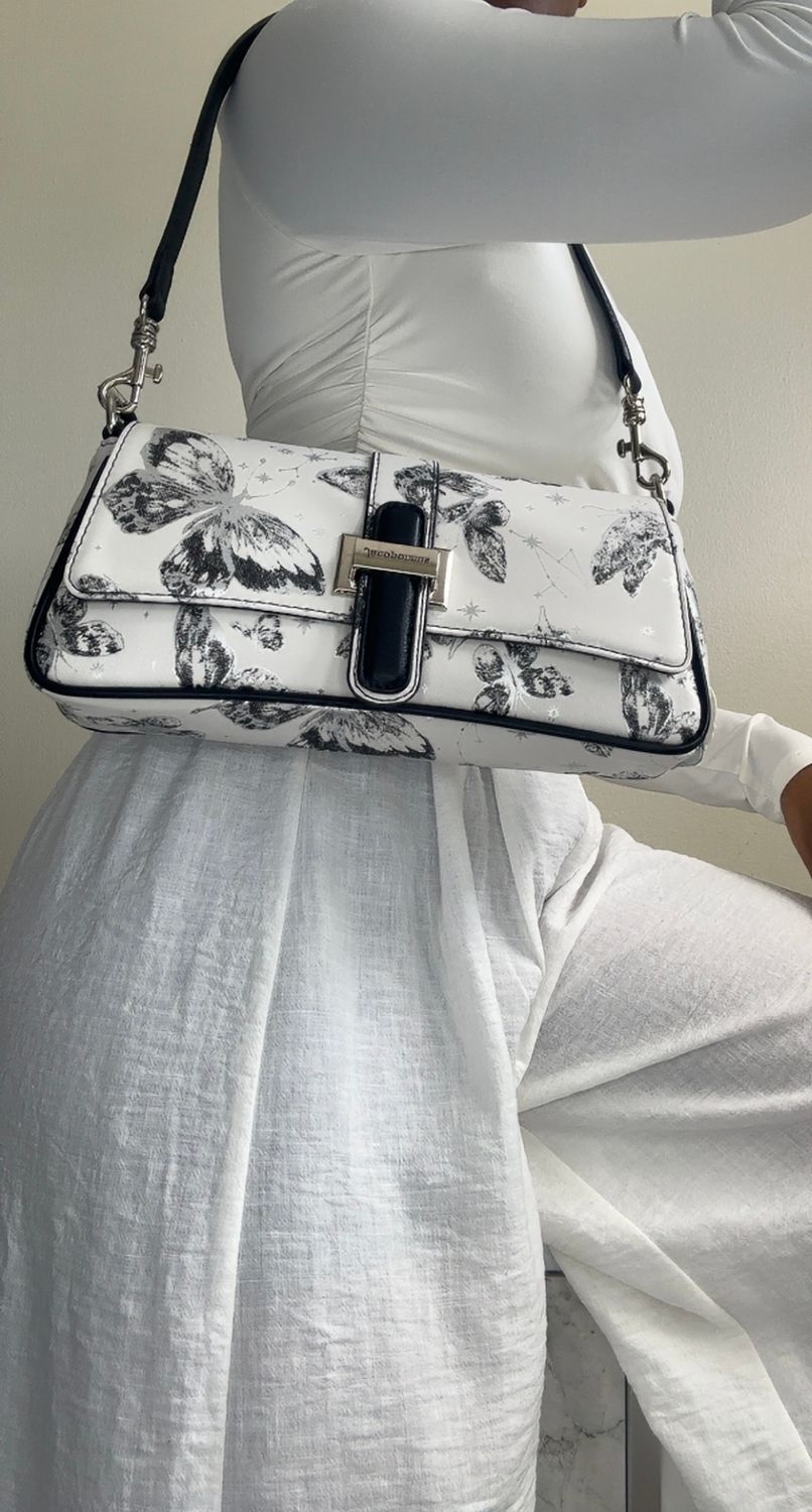 Luna crossbody bag designed with whimsical Butterfly print &amp; Black Accents