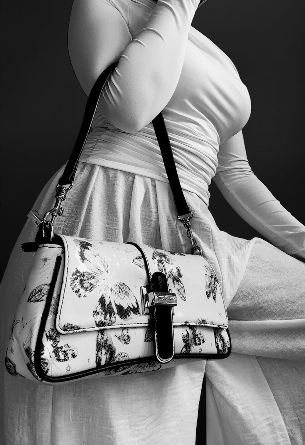 Luna crossbody bag designed with whimsical Butterfly print &amp; Black Accents