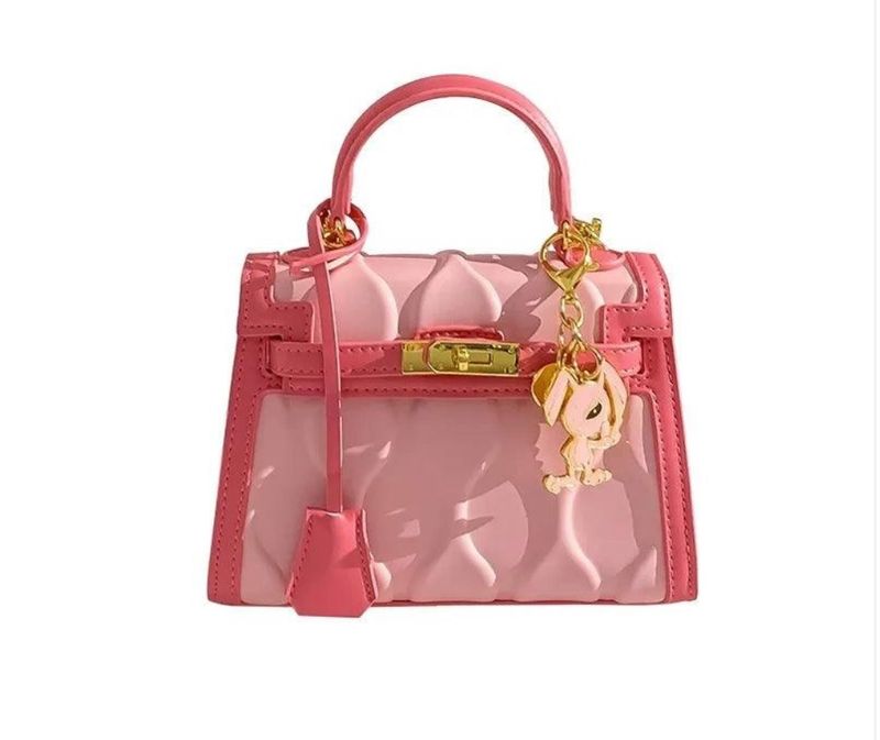 The Pink Muse- Pink Handbag with Unique Design and Gold Lock Detailing