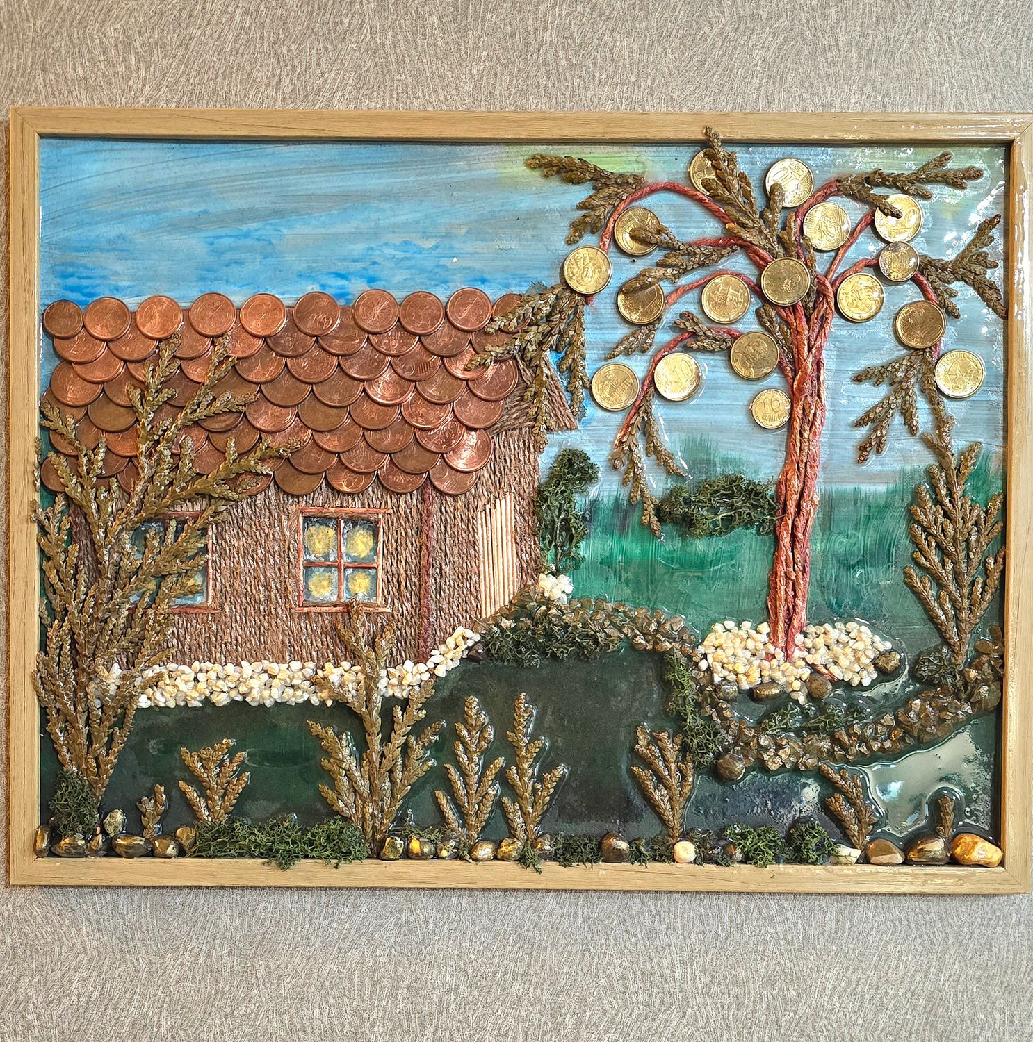 . real coin wall art

. euro and Ukrainian currency art

. money mixed media wall decor

. coin house artwork

. dried plant and resin wall art

. 10 kopiyok Ukrainian coin gift

. resin sealed nature art

. symbolic wall art with rare coins

. one of a kind money art

. Germany euro coin decor