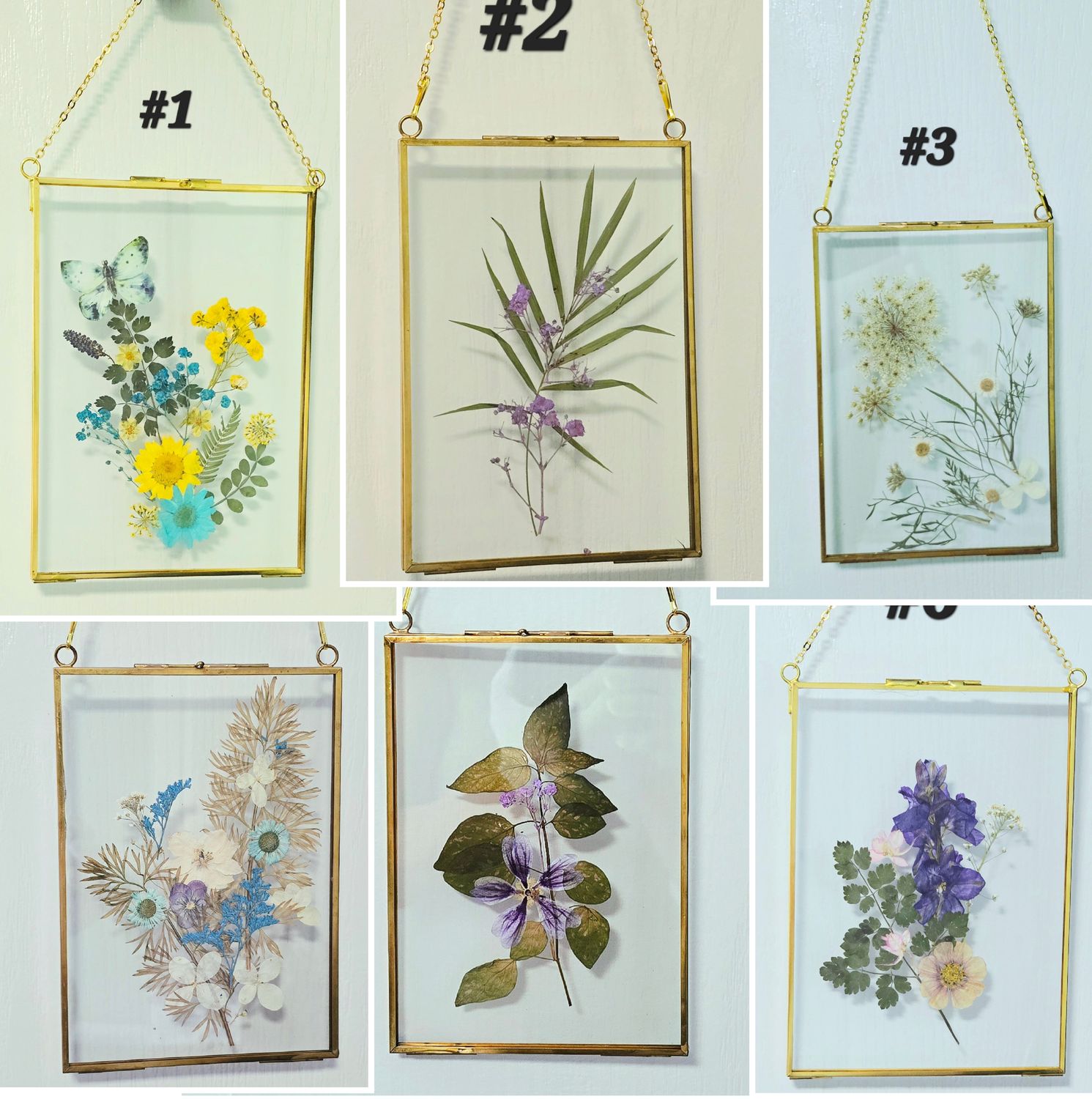 Vertical botanical glass wall art with real pressed flowers in a gold frame, size 5.25 x 7.25 inches
