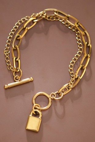 Stainless steel chain link bracelet with lock charm.
