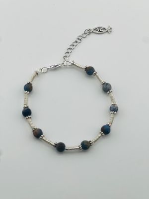 Boho Blue Spring Bracelet – Handcrafted Spiral Design with Rustic Blue Glass Beads on Silver-Plated Wire