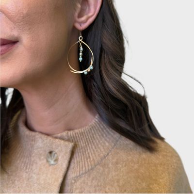 Modern Bohemian Gold Cross-Over Hoop Earring