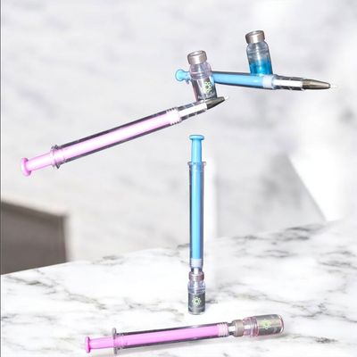 Ink pen with vial cap