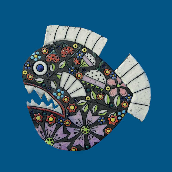 Raku flower fish on a blue card by Annabel Langrish