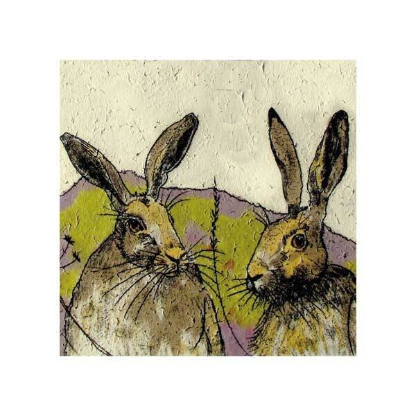 Hares on a green hill by Annabel Langrish