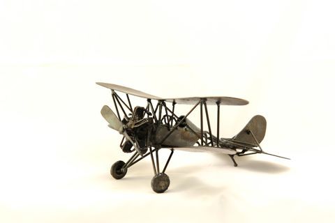 Handcrafted scale model biplane – decorative airplane

