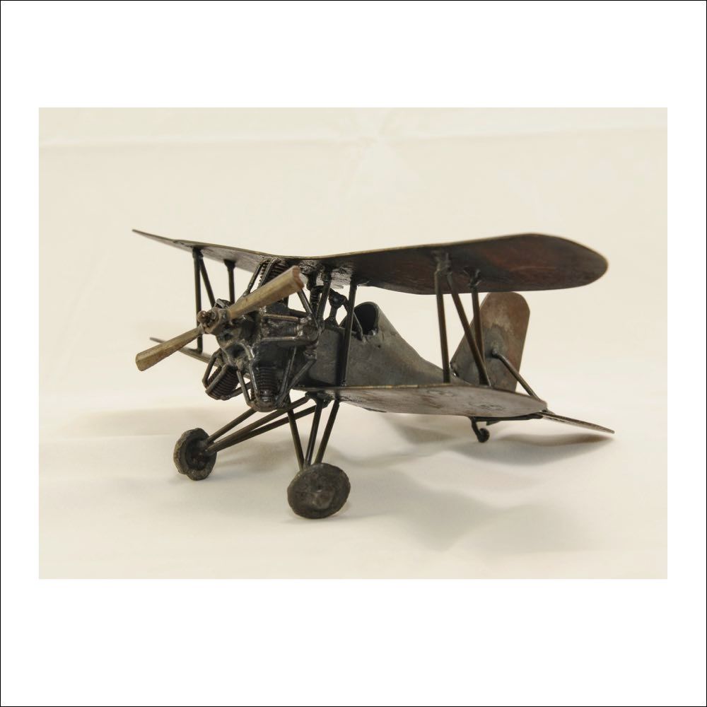 Handcrafted scale model biplane – decorative airplane