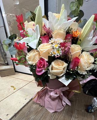 Peach,pink rose and white lily bouquet