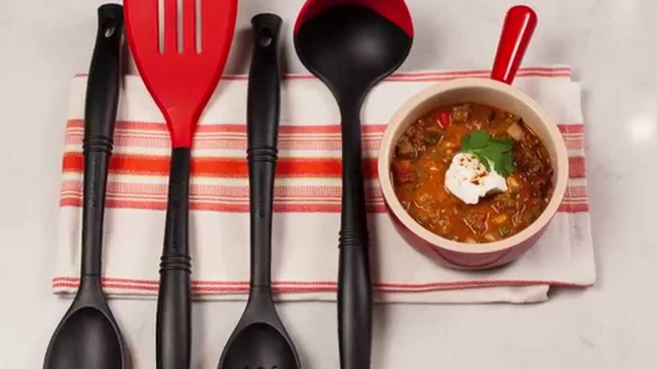 Revolution® Bi-Material Slotted Spoon - Cerise, 13.5&quot; x 2.5&quot; | Le Creuset
