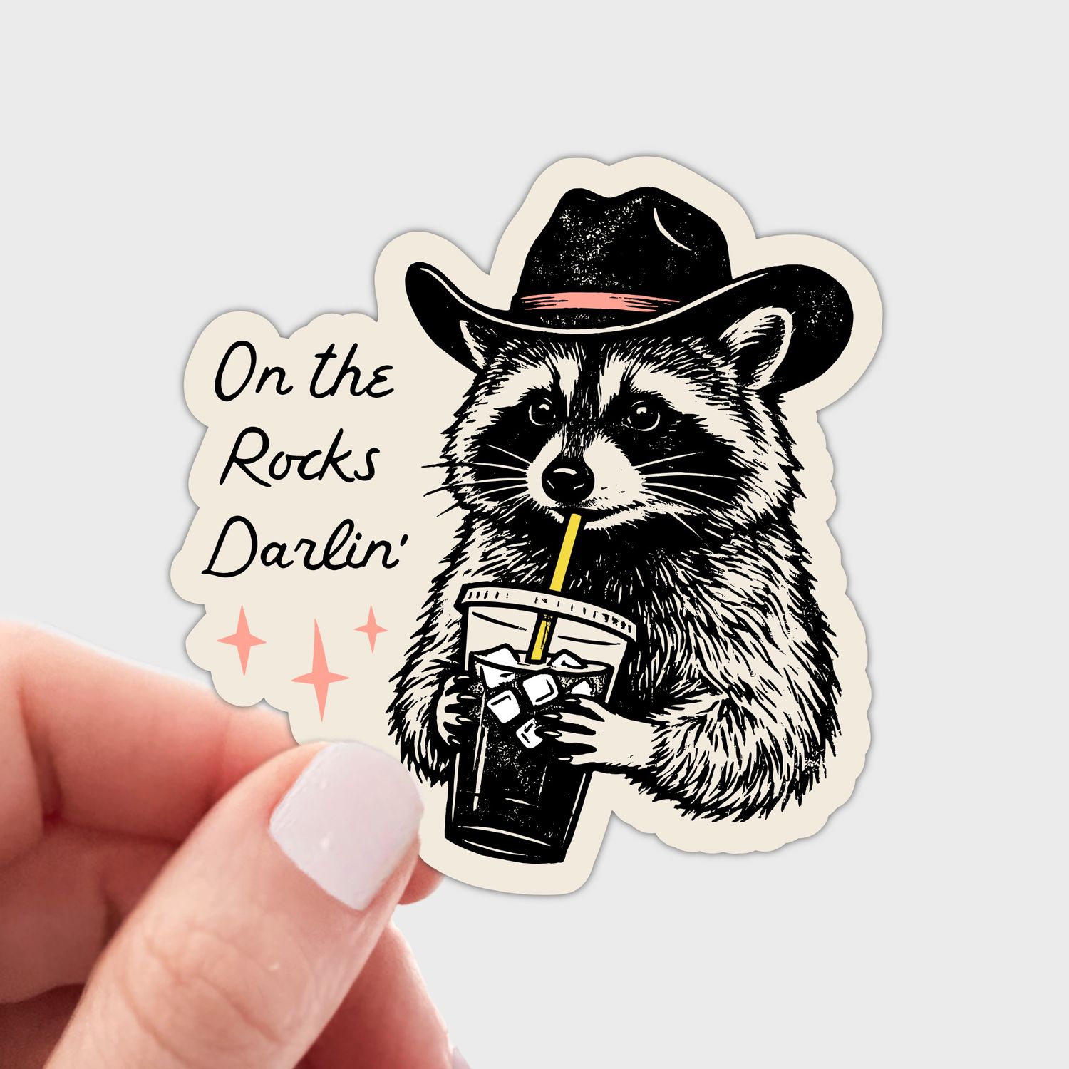 On the Rocks Darlin' Sticker - iced coffee, raccoon, cowboy
